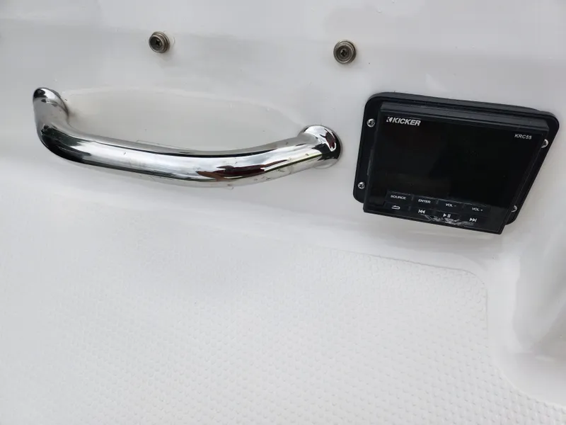 Slide: The Image of 2021 Campion Allante 20 Bowrider dashboard with Kicker audio system and chrome handle. - 10