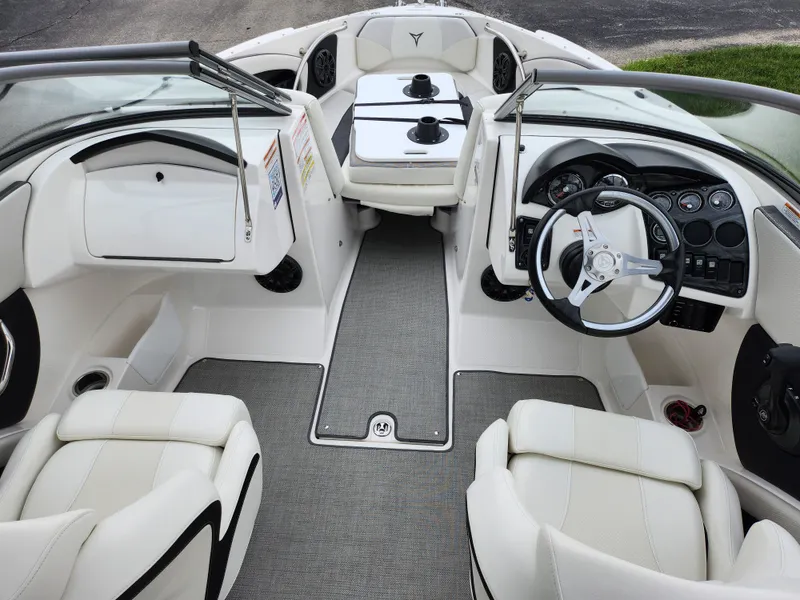 Slide: The Image of 2021 Campion Allante 20 Bowrider interior with white leather seats and modern dashboard. - 13
