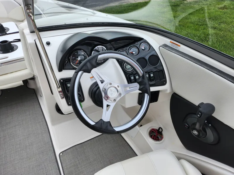 Slide: The Image of 2021 Campion Allante 20 Bowrider dashboard and steering wheel. - 14