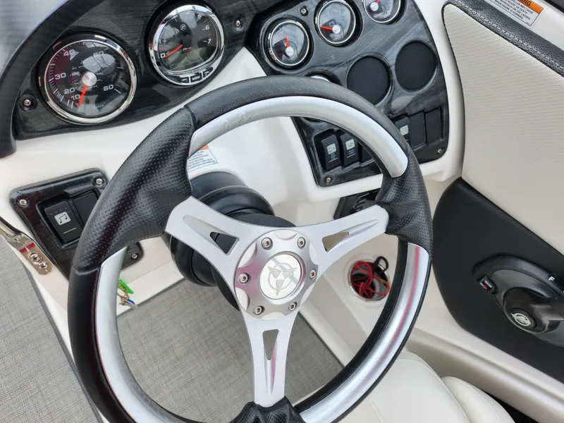 Slide: The Image of Steering wheel and dashboard of 2021 Campion Allante 20 Bowrider boat. - 15