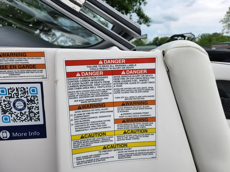 Slide: The Image of Warning labels on a 2021 Campion Allante 20 Bowrider boat. - 16