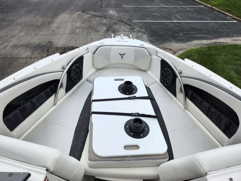 Slide: The Image of 2021 Campion Allante 20 Bowrider boat interior with white seating and table. - 19