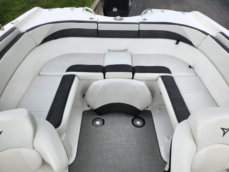 Slide: The Image of 2021 Campion Allante 20 Bowrider interior seating area with white and black upholstery. - 24