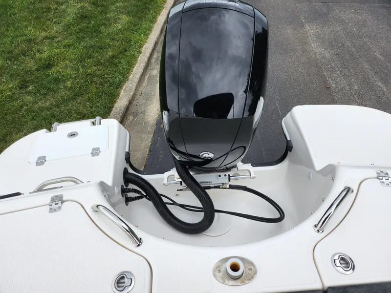 Slide: The Image of 2021 Campion Allante 20 Bowrider boat engine and stern view. - 25