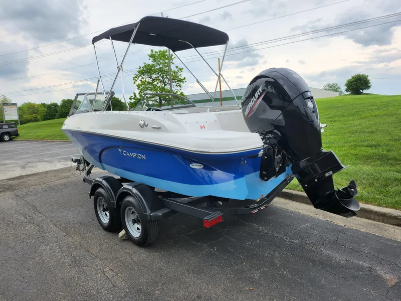 Slide: The Image of 2021 Campion Allante 20 Bowrider boat with outboard motor on a trailer. - 3
