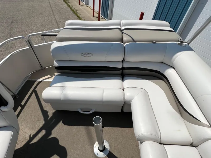 Slide: The Image of 2006 Harris FloteBote 250 Super Sunliner pontoon boat seating area. - 13