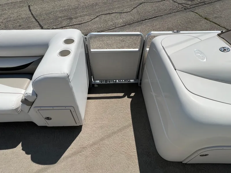 Slide: The Image of 2006 Harris FloteBote 250 Super Sunliner interior seating and gate. - 7