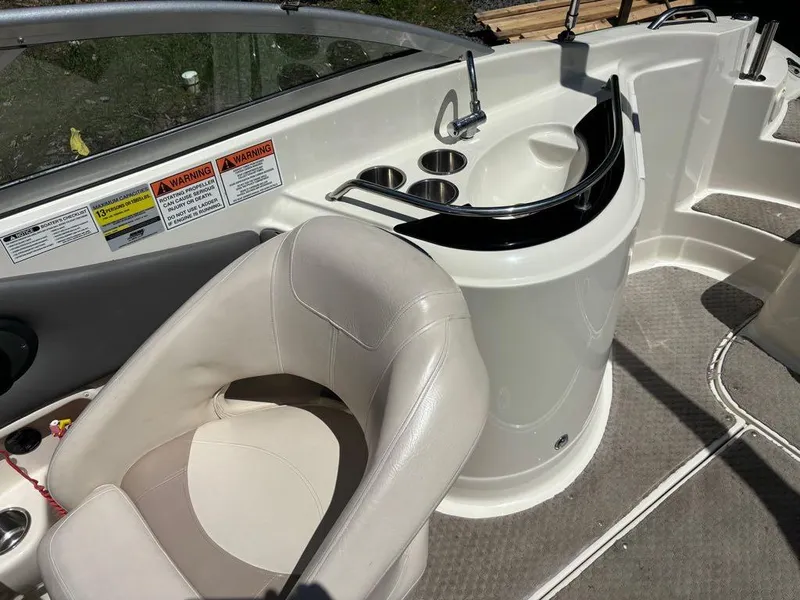 Slide: The Image of 2007 Azure AZ240 boat interior with seating and sink area. - 15