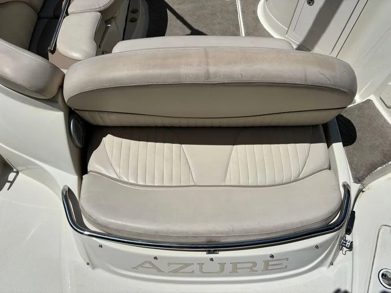 Slide: The Image of 2007 Azure AZ240 boat with beige leather seating and chrome accents. - 18