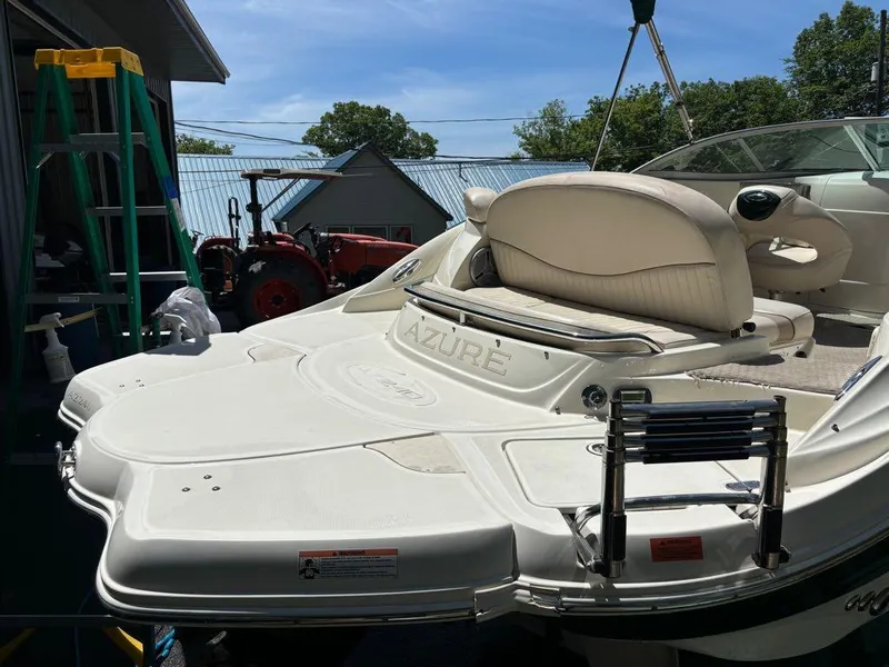 Slide: The Image of 2007 Azure AZ240 boat with swim platform and ladder in a garage. - 7