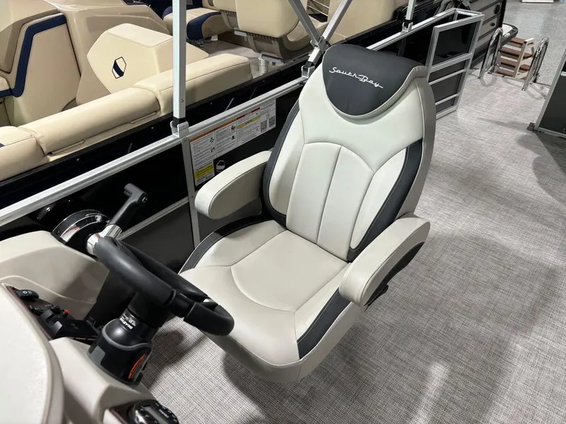 Slide: The Image of Captain's chair of 2024 South Bay 200 Series S222CR2 pontoon boat. - 12