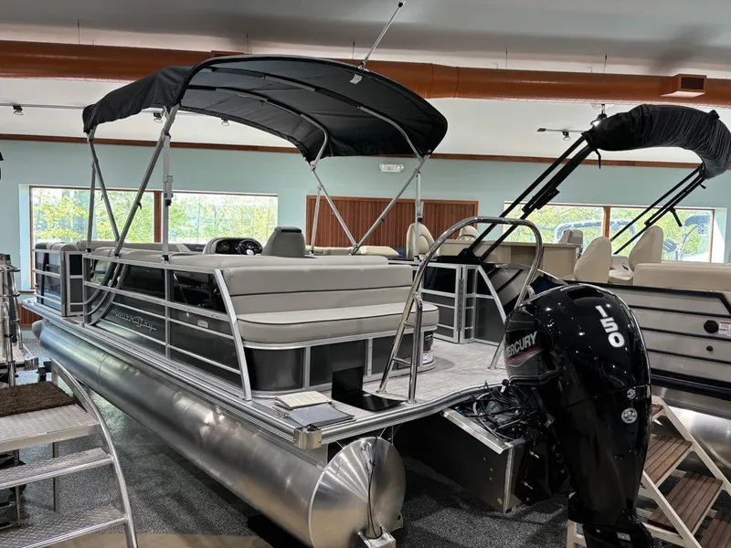 Slide: The Image of 2024 South Bay 200 Series S222CR2 pontoon boat with Mercury 150 outboard motor. - 17