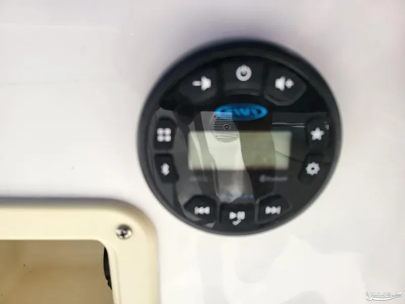 Slide: The Image of Close-up of 2021 Bayliner E 21 boat's control panel with digital display. - 10