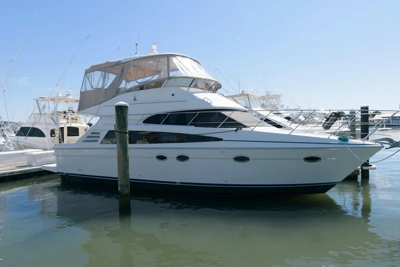 The Image of 2007 Carver 42 Super Sport yacht docked at marina. - 0