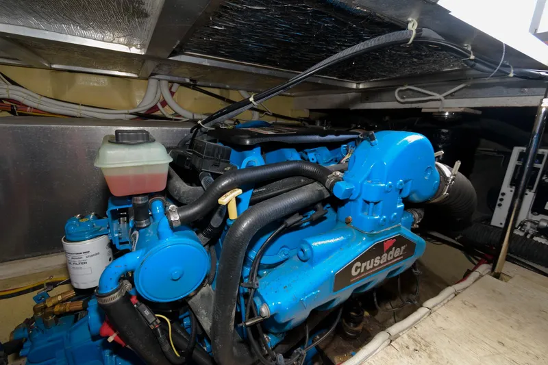 Slide: The Image of 2007 Carver 42 Super Sport engine room with Crusader engine. - 25