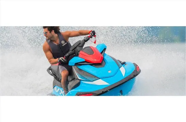 Slide: The Image of 2024 Yamaha WaveRunner VX jet ski with two riders on water. - 9