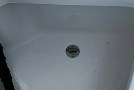 Slide: The Image of 2024 Tahoe 210 S boat interior drain area - 13