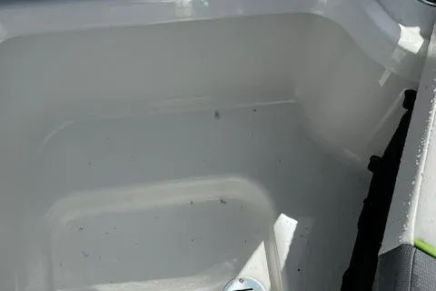 Slide: The Image of 2024 Tahoe 210 S boat storage compartment. - 15