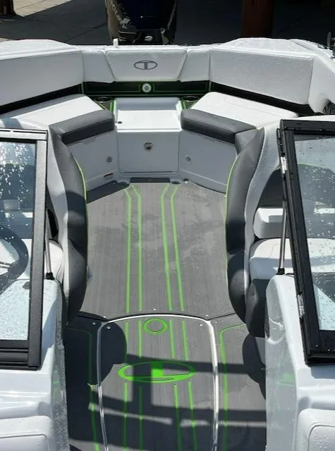 Slide: The Image of 2024 Tahoe 210 S boat interior with gray and green accents. - 7