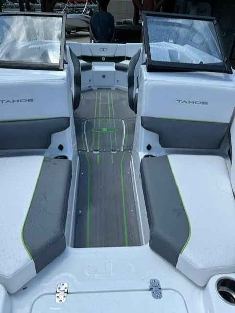 Slide: The Image of 2024 Tahoe 210 S boat interior with seating and windshield. - 8