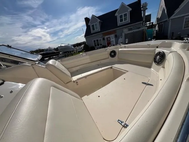 Slide: The Image of 2022 Grady-White Freedom 215 boat interior with spacious seating and modern amenities. - 26