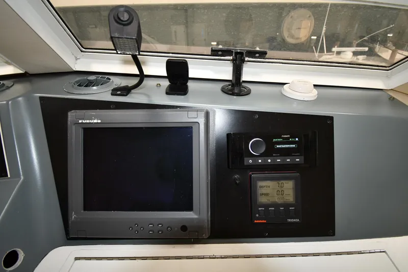 Slide: The Image of Control panel of a 1997 Viking 60 Cockpit Sport Yacht. - 37