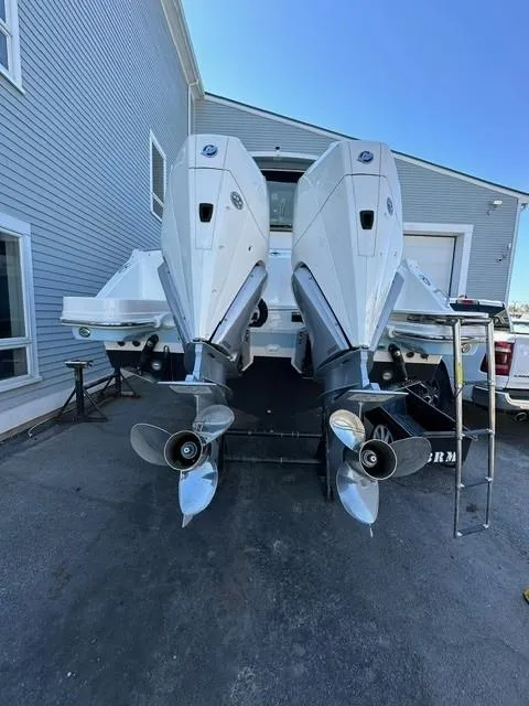Slide: The Image of 2023 Boston Whaler 280 Vantage with dual outboard engines. - 5