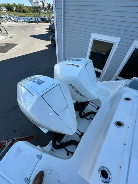 Slide: The Image of 2023 Boston Whaler 280 Vantage with twin Mercury outboard engines. - 7