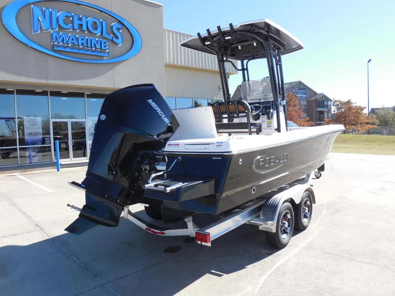 Slide: The Image of 2024 Robalo 226 Cayman boat on trailer at Nichols Marine dealership. - 3
