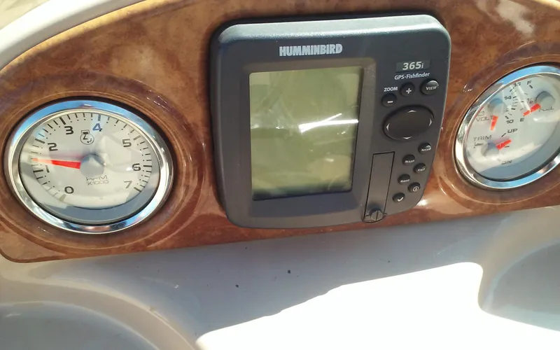 Slide: The Image of Dashboard of a 2012 Crest Classic 210 boat with Humminbird GPS and gauges. - 17