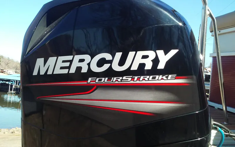 Slide: The Image of Mercury FourStroke engine on a 2012 Crest Classic 210 boat. - 21