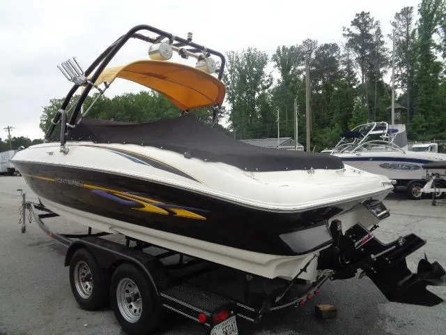 Slide: The Image of 2001 Monterey 218LS Montura boat on trailer, covered and ready for transport. - 3