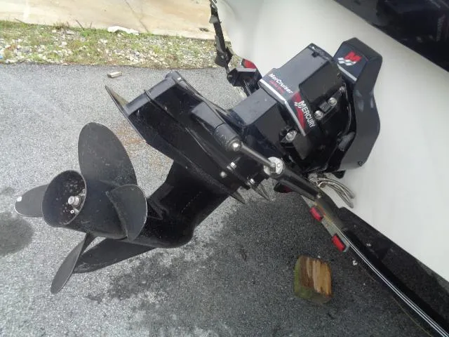 Slide: The Image of Close-up of a 2001 Monterey 218LS Montura boat's outboard motor and propeller. - 6