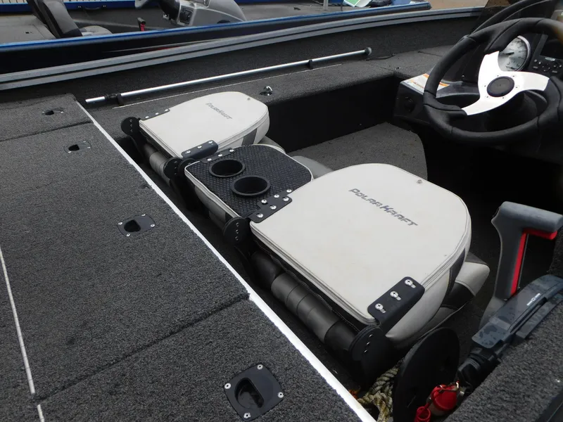 Slide: The Image of 2018 Polar Kraft 175TX Pro boat interior with seating and steering wheel. - 5