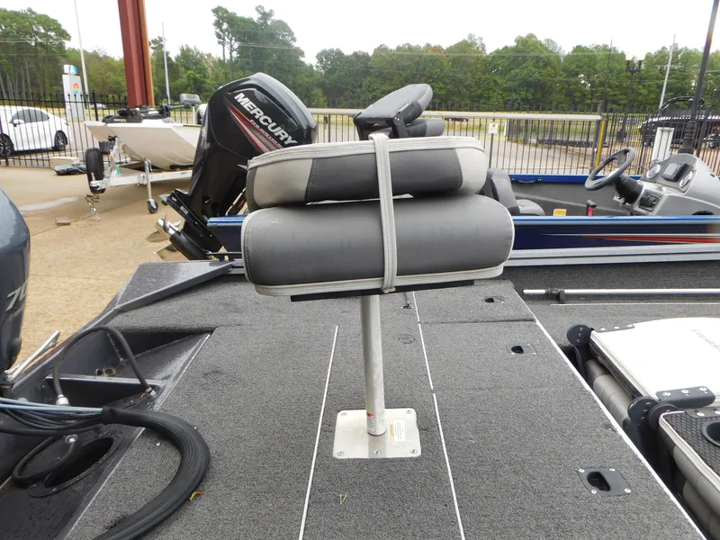 Slide: The Image of 2018 Polar Kraft 175TX Pro boat with gray seating and Mercury outboard motor. - 6