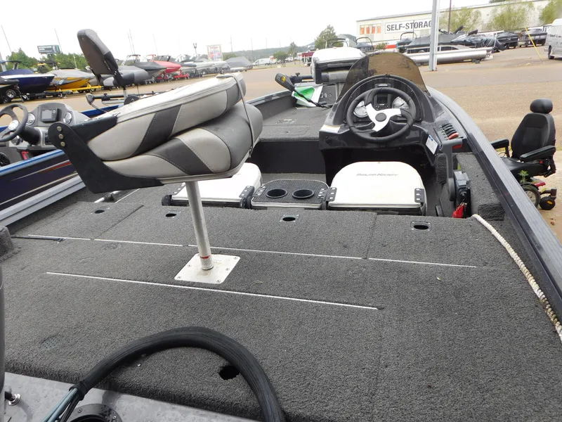 Slide: The Image of 2018 Polar Kraft 175TX Pro fishing boat interior with steering wheel and seating. - 8