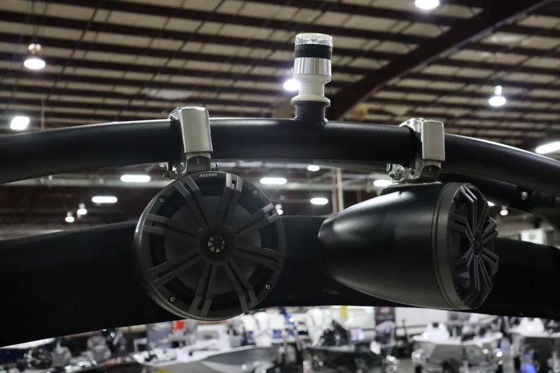 Slide: The Image of Speakers and light on a 2017 Regal 2000 ESX Bowrider boat in a showroom. - 3