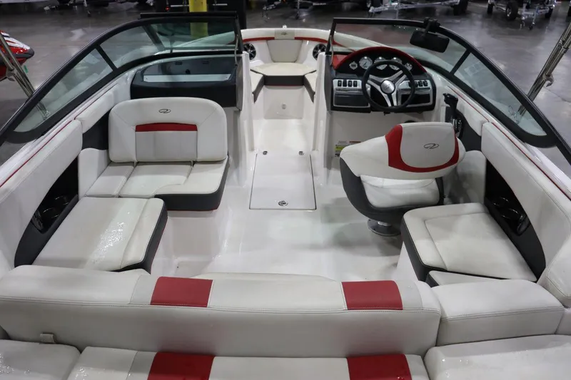 Slide: The Image of 2017 Regal 2000 ESX Bowrider interior with white and red seating. - 5