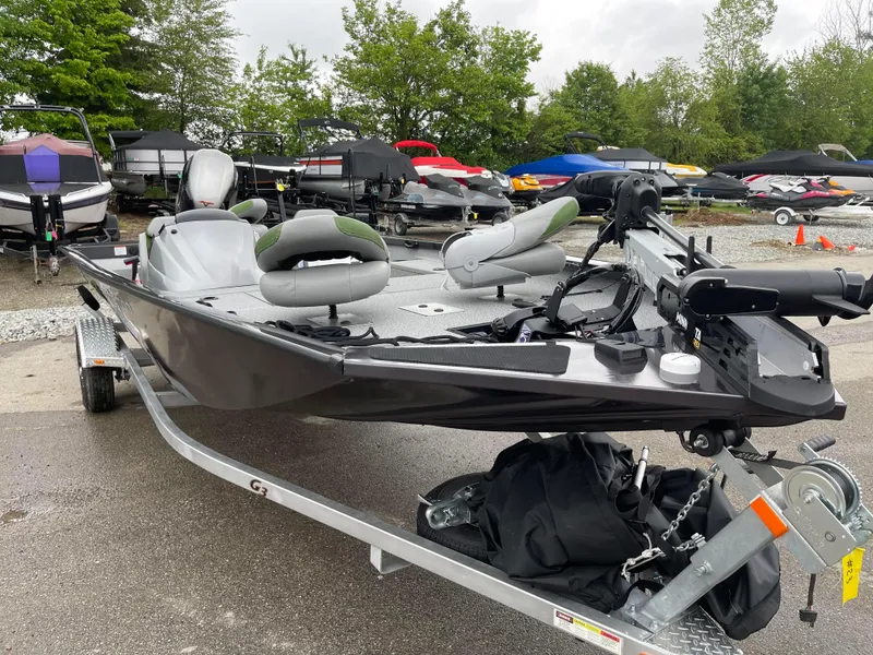 Slide: The Image of 2024 G3 Sportsman 1810 PFX fishing boat on a trailer in a boatyard. - 10