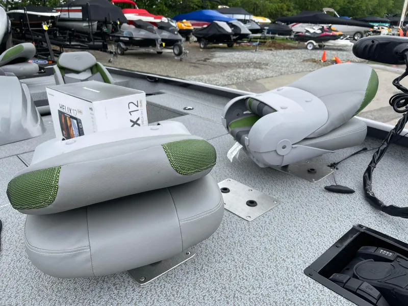 Slide: The Image of 2024 G3 Sportsman 1810 PFX boat interior with seats and equipment. - 11