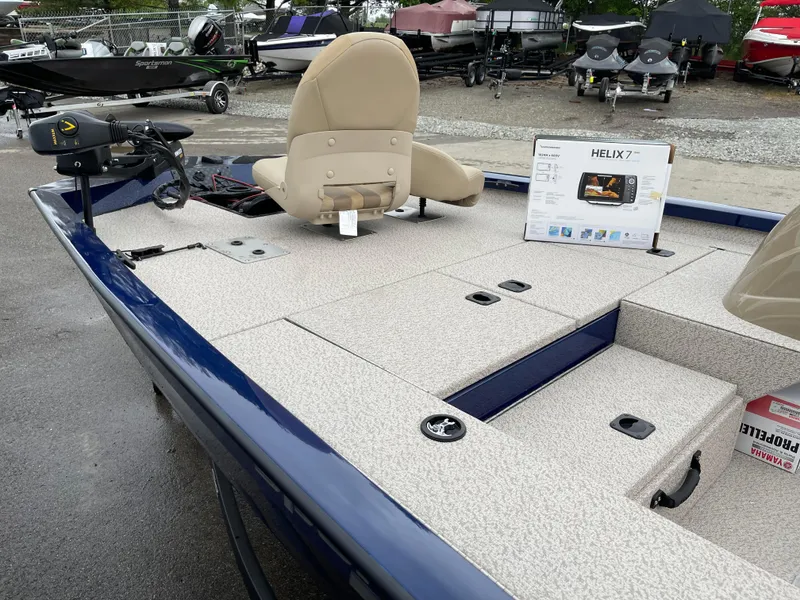 Slide: The Image of 2024 G3 Sportsman 1810 PFX fishing boat with beige seating and Helix 7 fish finder. - 15