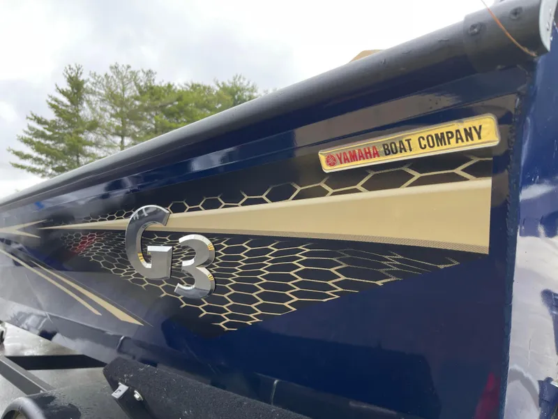 Slide: The Image of 2024 G3 Sportsman 1810 PFX boat with Yamaha Boat Company branding. - 7