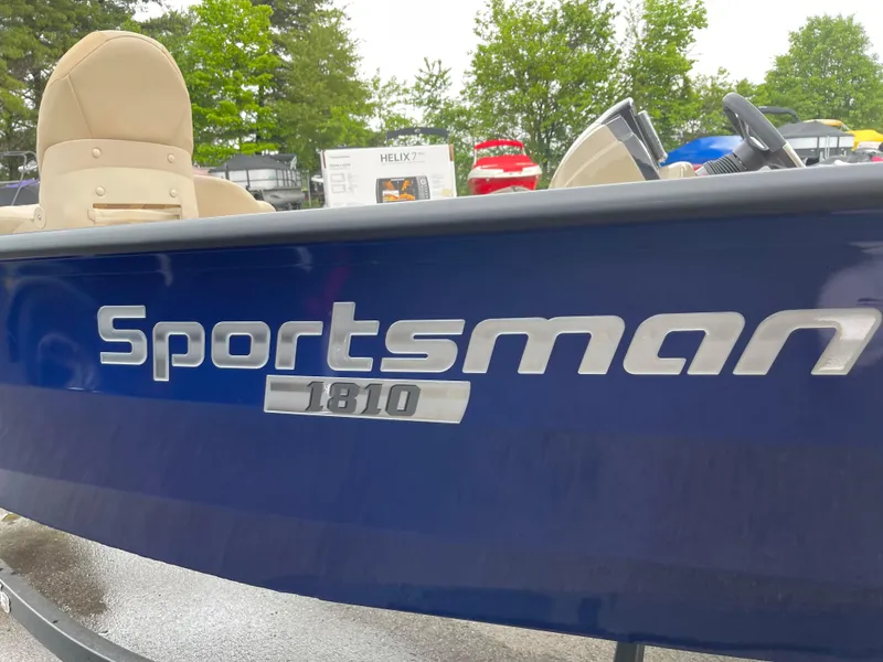 Slide: The Image of 2024 G3 Sportsman 1810 PFX boat side view with logo. - 9