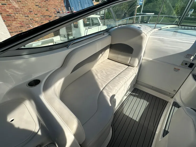 Slide: The Image of 2007 Chaparral 310 Signature boat interior with white leather seating. - 10