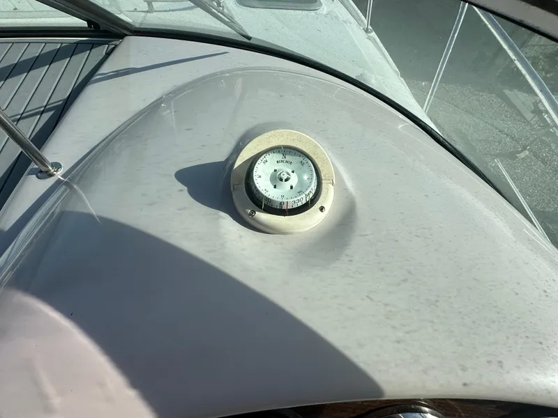 Slide: The Image of 2007 Chaparral 310 Signature boat compass on dashboard. - 12