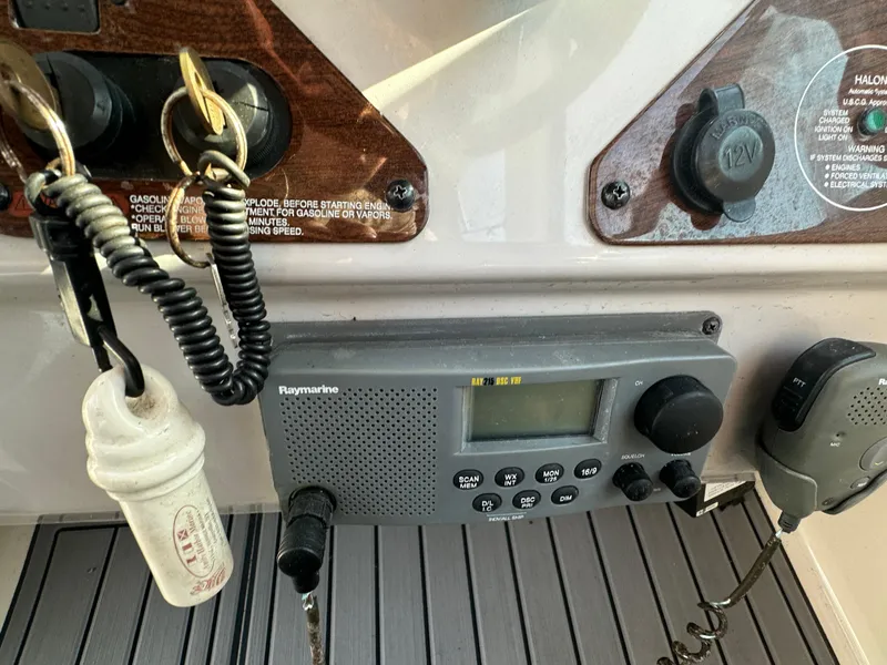 Slide: The Image of Boat control panel of a 2007 Chaparral 310 Signature with Raymarine radio. - 17