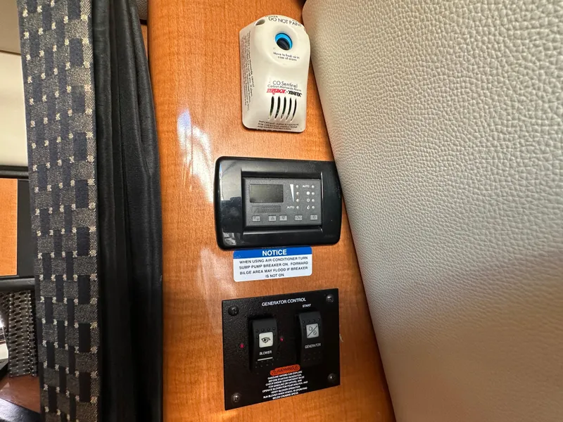 Slide: The Image of Control panel and safety devices inside a 2007 Chaparral 310 Signature boat. - 30