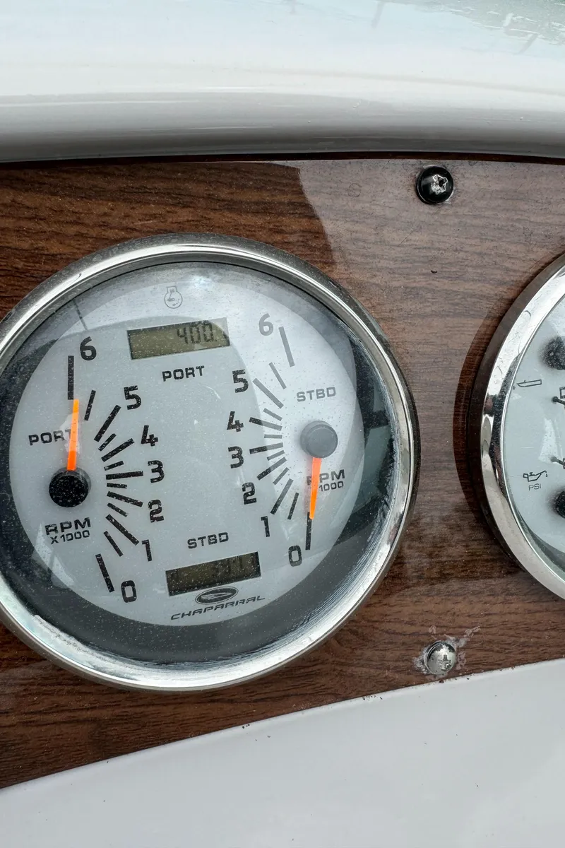 Slide: The Image of Close-up of 2007 Chaparral 310 Signature boat dashboard gauges. - 35