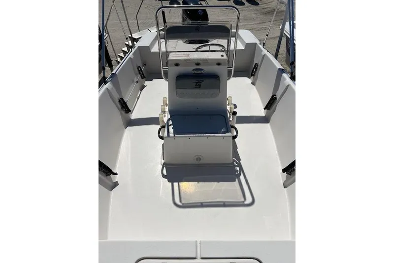 Slide: The Image of 2024 Carolina Skiff EV198 Sea Skiff interior view, showcasing seating and console. - 8