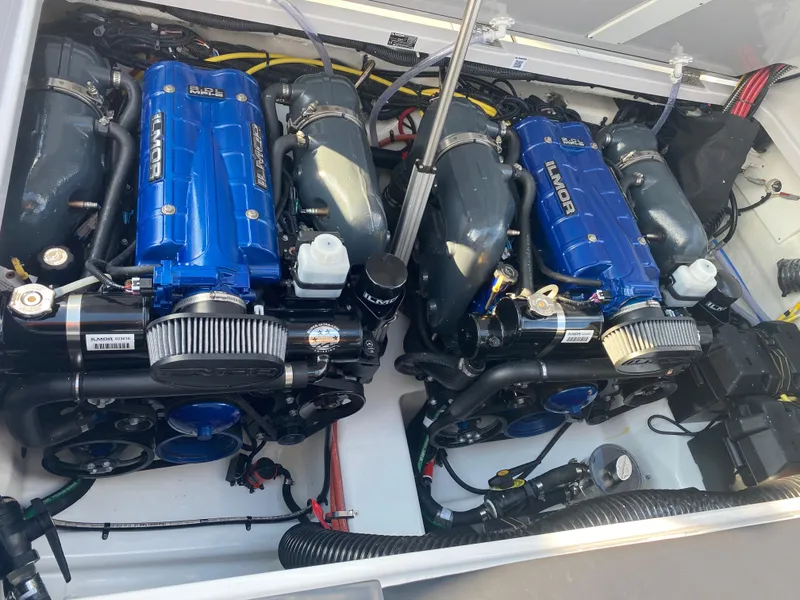 Slide: The Image of Twin engines in a 2020 Aviara AV32 I/O boat, showcasing powerful performance. - 27